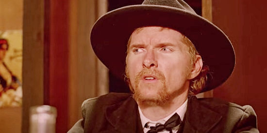 Davy Williams as A. Pettigrew, sensing gathering trouble in the Angel Cloud Saloon in Mr. Pettigrew (2024)