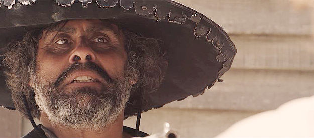 Renny Zapato as El Perro, a six-gun trained on Clare Peralta for a second time in The Dutchman (2020)