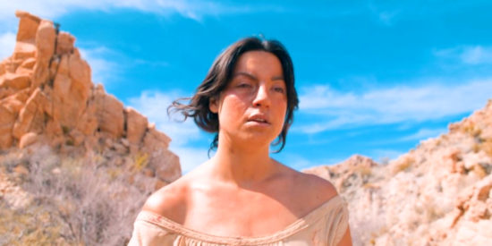 Baylee Toney as Charlotte, heading into the wilderness for vengeance and to free a captured sister in Over the Red River (2024)