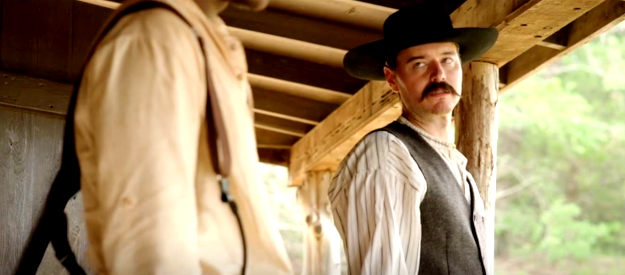 Blaine Hall as Wyatt Earp, ready to lead Curtis Griffin to safety in Doc Holliday 3 (2024)