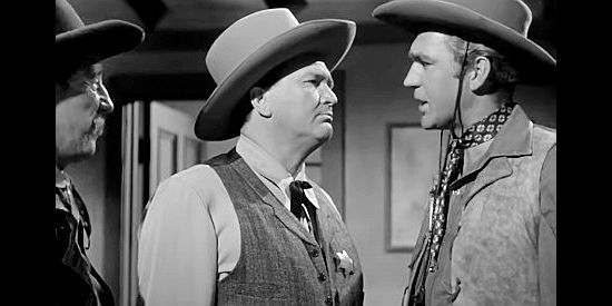 Charles Cane as the sheriff debating how to deal with the Monk with Zeke Butler in Adventures in Silverado (1948)