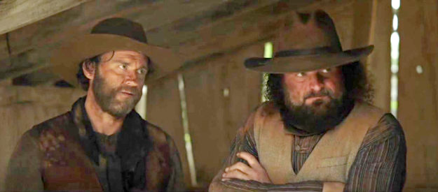 Chase DeMoss as Jimmy Ripsaw and Erik Baker as brother Jimmy, discussing their next move in Doc Holliday 3 (2024)