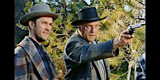 Howard Petrie (right) as Rick Barton, the man who helps carry out the Powell family's dirty deeds in Woman of the North Country (1952)