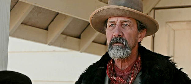 John Marrs as Kent, leader of the outlaw gang in Ghosts of Red Ridge (2024)