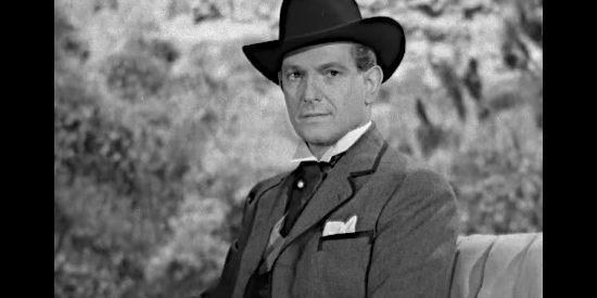 Joseph Schildkraut as Tito Morell, the man who wants to rule Flaxen and the rest of San Francisco in Flame of the Barbary Coast (1945)