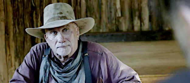 Kenny Schreiber as Charlie Pierce, the old-timer who helps George and Dunn escape the shootout in Ingalls in Lady Outlaw (2024)