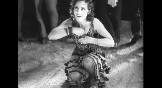 Maria Alba as Carmelita, stashing away the coins she earned dancing at the New Jerusalem saloon in Hell's Heroes (1929)