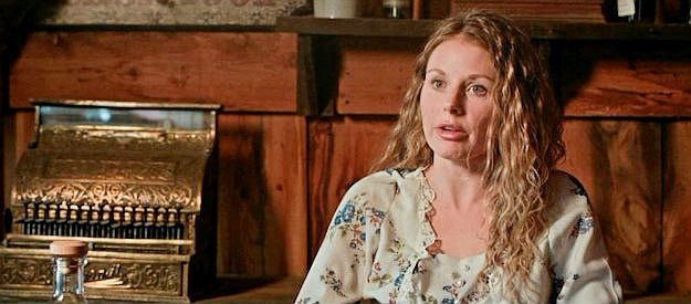 Mercedes Peterson as Mary, the saloon owner sweet on the sheriff in Ghosts of Red Ridge (2024)