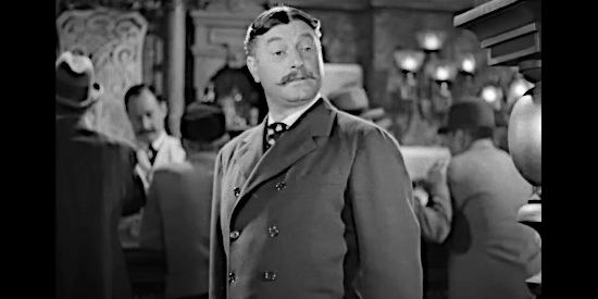 Rex Lease as Collingwood, one of Tito Morell's trusted employees in Flame of the Barbary Coast (1945)