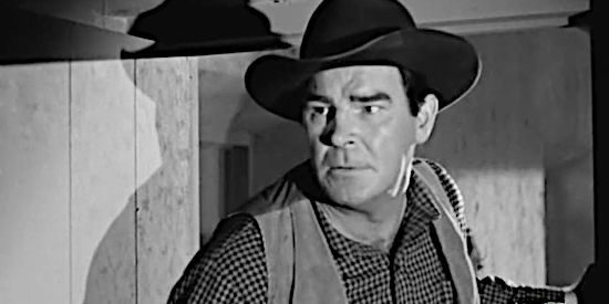 Rob Cameron as Webb Dunham, rushing to Linda's aid after he hears her scream in Yaqui Drums (1956)