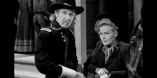 Addison Richards as Gen. Custer, conferring with Jane (Frances Farmer) on the likelihood of Indians robbing stagecoaches in Badlands of Dakota (1941)