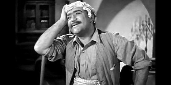 Akim Tamiroff as Mio Pio, Cecilia's assistant, singing who he mops the floor in Texas Rangers Ride Again (1940)