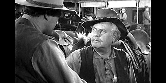 Alan Hale as Cheyenne second deputy Fred Durkin, listening to Wylie's plans for catching The Poet in Cheyenne (1947)