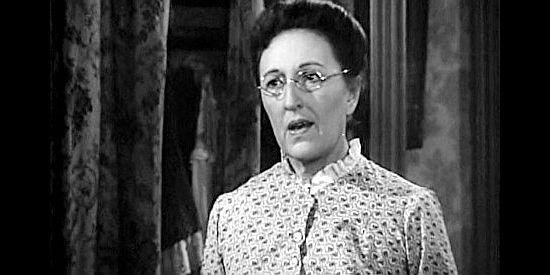 Ann O'Neal as boarding house owner Miss Kittridge, caught by surprise when told Ann has a husband in Cheyenne (1947)