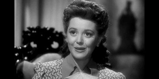 Ann Rutherford as Anne Grayson, already dreaming of adventures out West in Badlands of Dakota (1941)