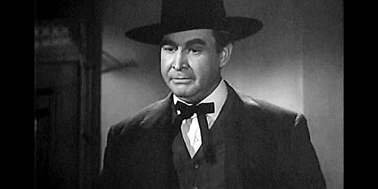 Barton MacLane as Webb Yancey, convincing James Wylie he should help Wells Fargo find the Poet in Cheyenne (1947)