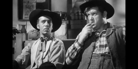 Bradley Page as Jesse Chapman and Andy Devine as Spearfish in Badlands of Dakota (1941)