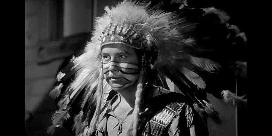 Broderick Crawford as Bob Holliday, disguised as an Indian to rob a bank in Badlands of Dakota (1941)