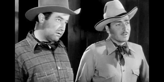 Broderick Crawford as Mace Townsley and John Howard as Jim Kingston, about to go undercover in Texas Rangers Ride Again (1940)