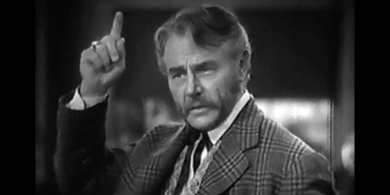 Charles Ruggles as Chuckawalla Bill Redfield, defending Rev. Pharo when he's accused of murder in The Parson of Panamint (1941)