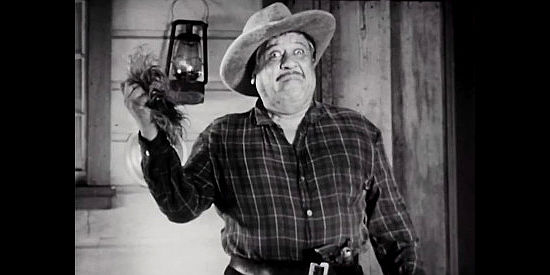 Chris-Pin Martin as Pancho, getting a surprise when he tries to sober up the Marlowe ranch hands and winds up holding a toupee in The Return of WIldfire (1948)