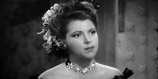 Diana Barrymore as Claire, concerned about Steve Logan's safety in Frontier Badmen (1943)