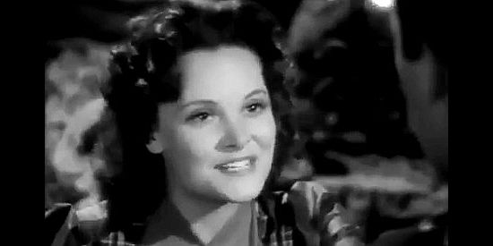 Elizabeth Inglis (aka Elizabeth Earl) as Linda Conniston, thrilled for a reunion with the man she thinks is her brother in River's End (1940)