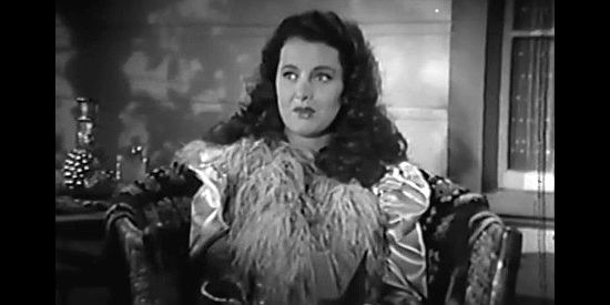 Ellen Draw as saloon singer Mary Mallory, recuperating at the reverend's home in The Parson of Panamint (1941)