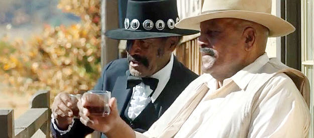 Fred Williamson and Jim Brown, raising a glass to Johnny Black in Outlaw Johnny Black (2023)