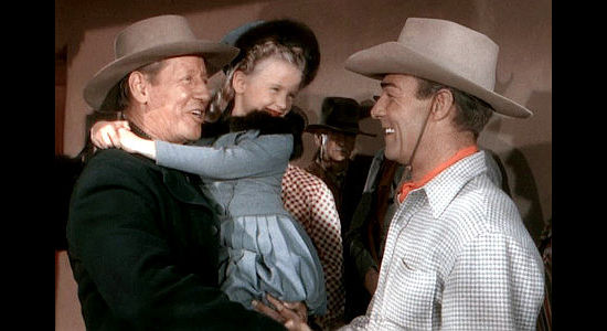 Irving Bacon as Dave Wallace, pledging to help Cole Armin (Randolph Scott) anyway he can with daughter Mrytle (Karolyn Grimes) looking on in Albuquerque (1948)