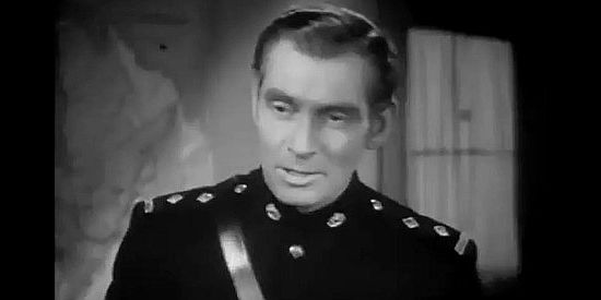 James Stephenson as Inspector McDowell, the man who sends Sgt. Conniston to bring back John Keith in River's End (1940)