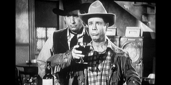 Joe E. Brown as Wellington Holmes, realizing his celebration of the demise of Buckskin Bill (Victor Jory) was a bit premature in Shut My Big Mouth (1942)