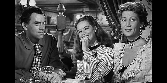 John Ireland as Bitter Creek, Dona Drake as Cattle Annie and Louise Allbritton as Rose of Cimarron, enjoying the fruits of thievery in The Doolins of Oklahoma (1949)