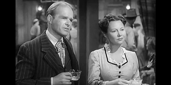 Louis Jean Heydt as John Stover and Virginia Carroll as his wife Matilda, talking about their plans to homestead in the West in Bad Men of Tombstone (1949)