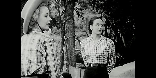 Mary Beth Hughes as Judy Marlowe and Patricia Morison as her sister Pat, admiring the same man in The Return of Wildfire (1948)