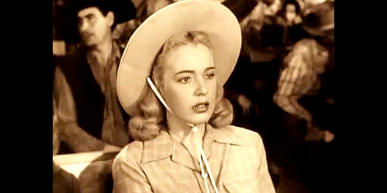 Mary Beth Hughes as Terry Williams, alarmed by a turn of events at Duke Barnum's trial in Last of the Wild Horses (1948)