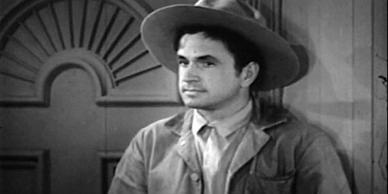 Noah Beery Jr. as Jim Cardwell, trying to steer Steve Logan back to Texas and out of danger in Frontier Badmen (1943)