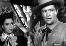 Jane Wyman as Ann Kincaid and Dennis Morgan as James Wylie, fearful their ruse is about to be discovered in Cheyenne (1947)