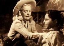 Mary Beth Hughes as Terry Williams, tending a wounded Duke Barnum (James Ellison) in Last of the Wild Horses (1948)