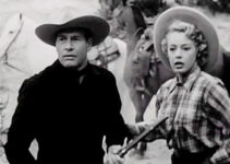 Richard Arlen as Dobe Williams and Mary Beth Hughes as Judy Marlowe, springing into action when a shot rings out in The Return of Wildfire (1948)