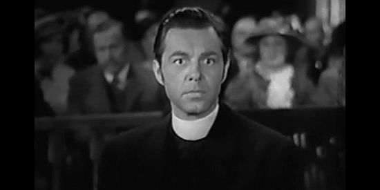 Phillip Terry as the Rev. Philip Pharo, awaiting Mary's answer to a shocking question in The Parson of Panamint (1941)