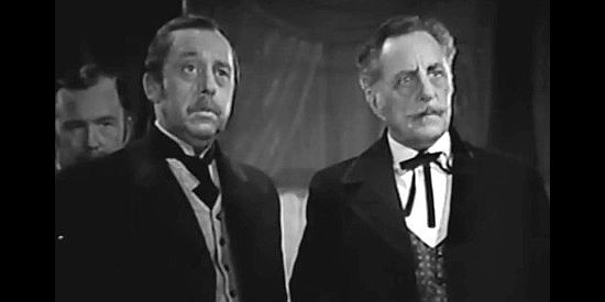 Porter Hall as Jonathan Randall and Henry Kolker as Judge Mason, town leaders concerned about the new parson in The Parson of Panamint (1941)