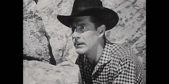 Reed Hadley as Marty Quinn, determined to control the wild horse market in The Return of Wildfire (1948)