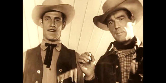 Reed Hadley as Riley Morgan and Roby Mallinson as Hank Davis, their plotting discovered in Last of the Wild Horses (1948)