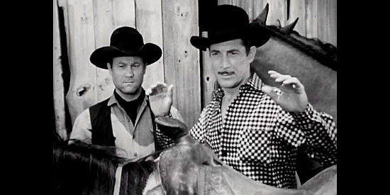 Reed Hadley (right) as Marty Quinn and henchman Dirk (Mike Ragan) caught stealing Marlowe horses in The Return of Wildfire (1948)