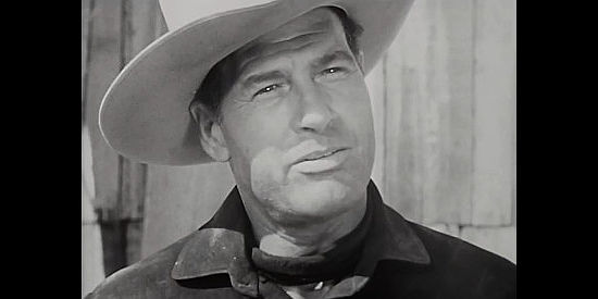 Richard Arlen as Dobe Williams, a drifter who finds a place to settle down in The Return of Wildfire (1948)