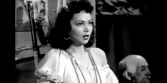 Steffi Duna as Cheeta, the girl who desperately wants to marry Andy Dijon, though she's not certain why in River's End (1940)