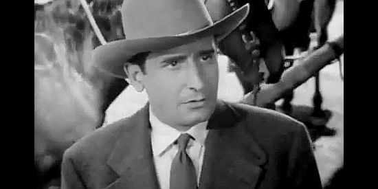 Victor Jory as Norman Talbot, the man Keith suspects of committing murder in River's End (1940)