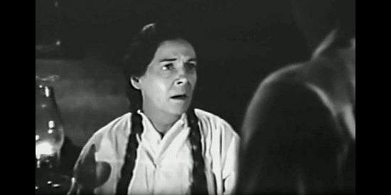 Virginia Brissac as Angela Cook, realizing one of her grown twins plans to kill the other in Wagons Westward (1940)