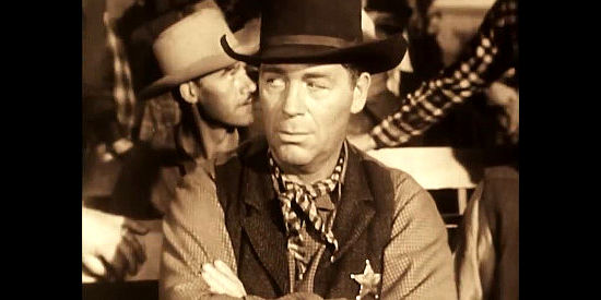 William Haade as Rocky Rockford, Riley Morgan's lead henchman, temporarily deputized in Last of the Wild Horses (1948)